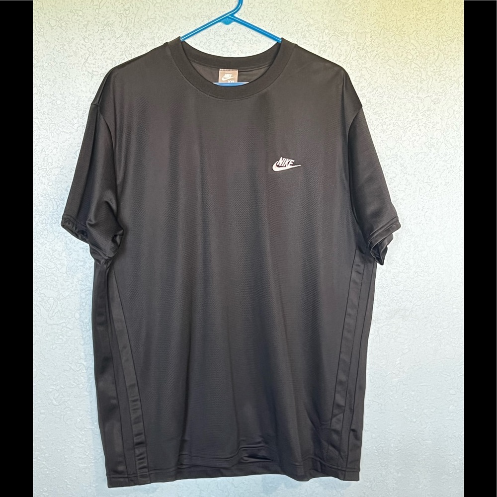 Nike moisture wicking DRI-FIT athletic shirt.